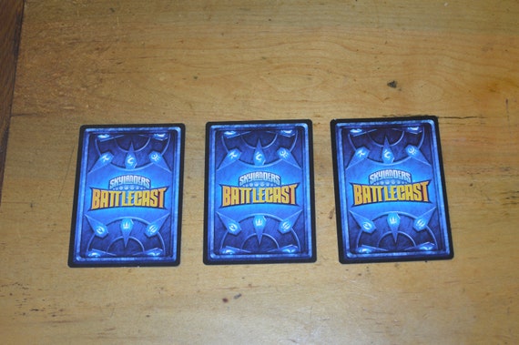 skylanders battlecast rare cards Amazon.com: Pokémon TCG: Sword & Shield – Lost Origin Triple Pack (3  Boosters & Regigigas Foil Promo Card) : Toys & Games