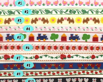 May include: Ten different types of white fabric ribbon trim with various colorful embroidered designs. The designs include flamingos, flowers, dogs, trains, strawberries, birds, and apples. Each ribbon is numbered 1 through 10.