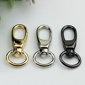 May include: Three metal swivel clasps in gold, silver, and black.