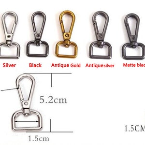 May include: Eight metal swivel clasps in different finishes: gold, silver, black, antique gold, antique silver, matte black, and bronze. The clasps are 5.2 cm long and 1.5 cm wide.