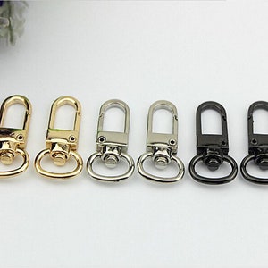 May include: Six metal swivel clasps in gold, silver, and black.