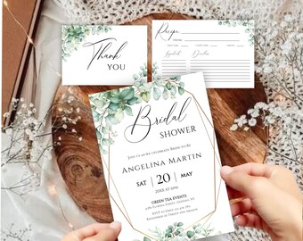 May include: A white bridal shower invitation with gold geometric frame and green watercolor leaves. The invitation reads "Bridal Shower" and includes the bride-to-be's name, date, time, and location. The text also includes RSVP information and registry details.