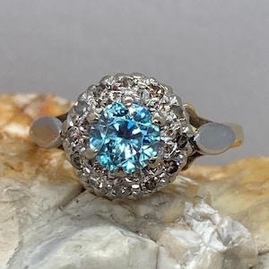 Blue zircon and diamond halo ring mid century 18ct size ukM1/2 usa61/2