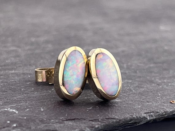 solid Opal oval 9ct gold studs earrings - image 1