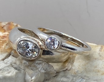 Pair of Solid silver and cz solitaire rings size ukL1/2 usa5.75