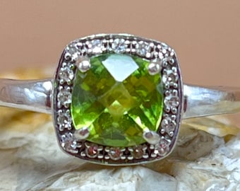 Contemporary white gold peridot diamond halo ring size ukM usa6