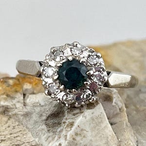 Green blue sapphire with diamond halo in 18ct gold with platinum settings size uk L USA 5.75