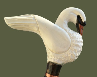 Bastón de cisne tallado a mano