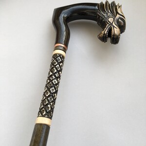 Wood carved walking cane