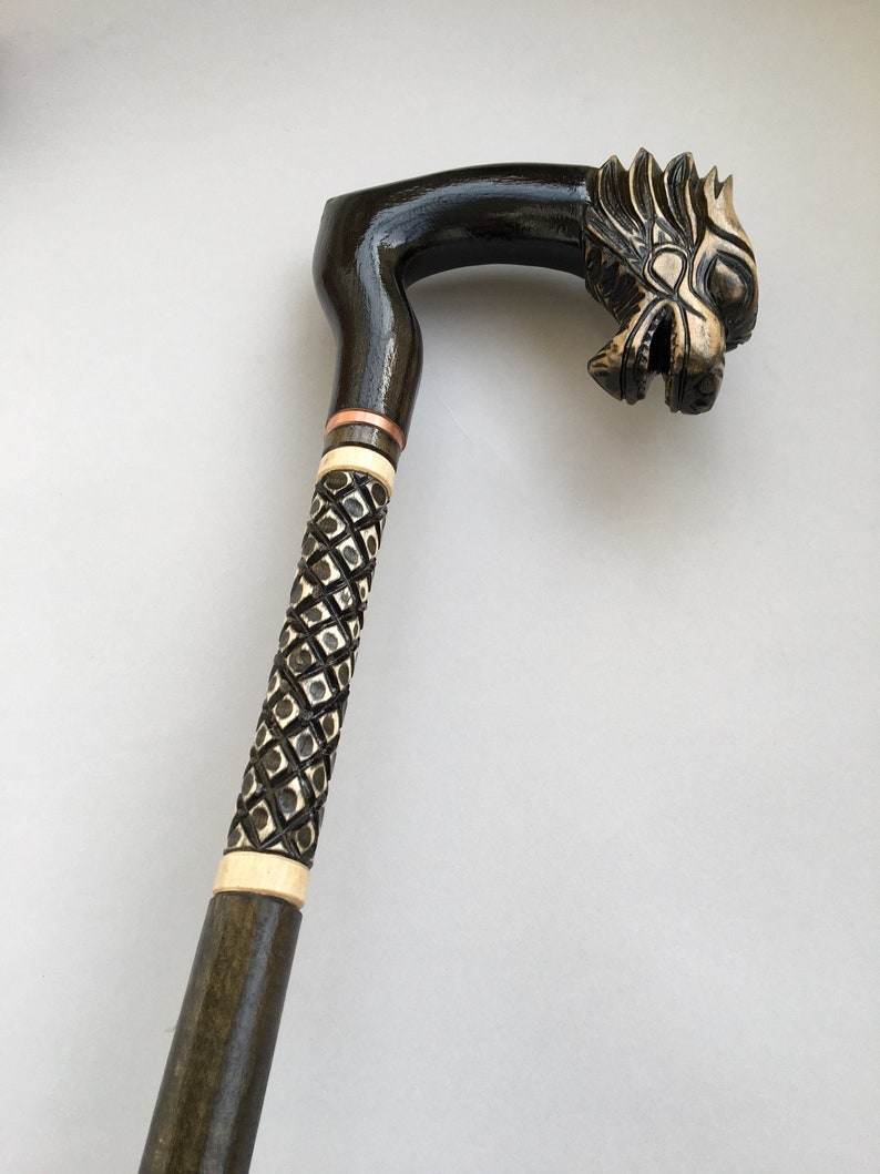 Wood carved walking cane