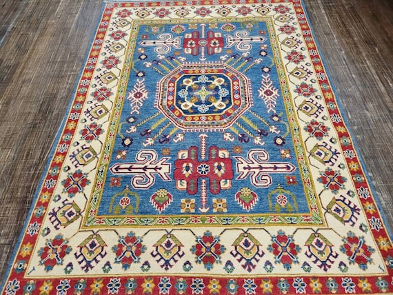 Afgan kazak Pakistani kazak  tribal rug hand knotted rug  transitional rug green and red  kazak size 5'×6'9"