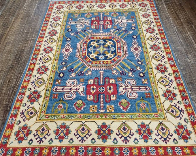 Afgan kazak Pakistani kazak  tribal rug hand knotted rug  transitional rug green and red  kazak size 5'×6'9"