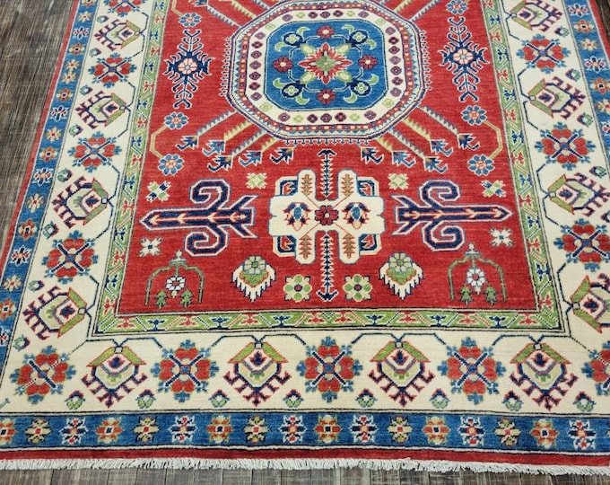 Afgan kazak Pakistani kazak  tribal rug hand knotted rug  transitional rug green and red  kazak size 5'3"×6'9"