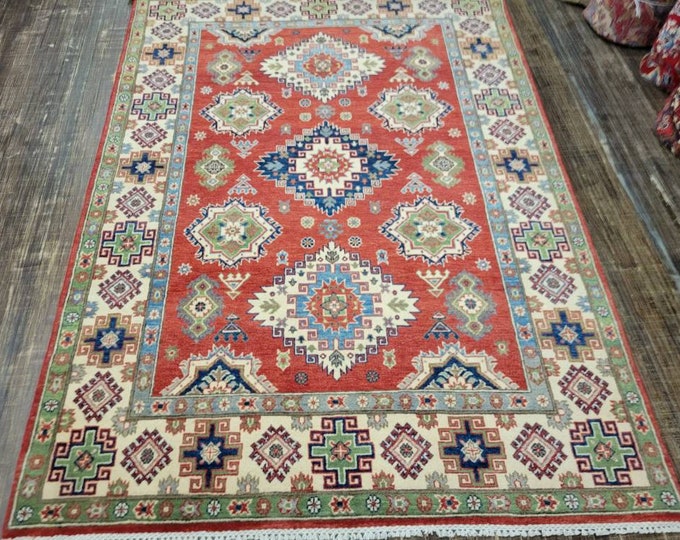 Afgan kazak Pakistani kazak  tribal rug hand knotted rug  transitional rug green and red  kazak size 5'8"×7'7"