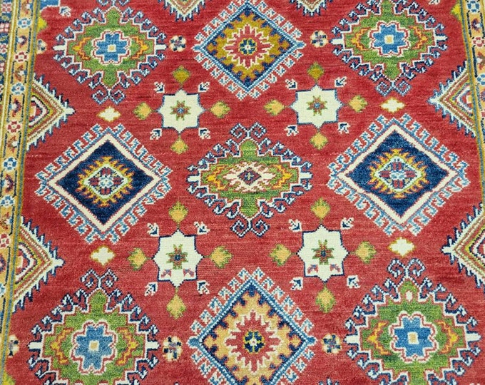 Afgan kazak Pakistani kazak  tribal rug hand knotted rug  transitional rug green and red  kazak size 5'×6'9"