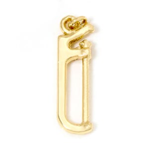 May include: Gold-toned metal charm shaped like a saw. The charm has a loop at the top for attaching to a necklace or bracelet.