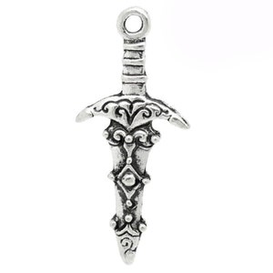 May include: Silver-toned sword charm with intricate details and a loop at the top for attaching to jewelry.