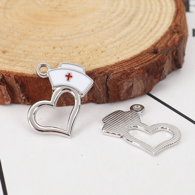 Enameled Antique Silver Nurse Heart Charm