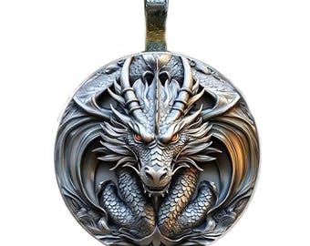 May include: A silver-colored pendant featuring a detailed dragon design. The dragon has intricate scales, horns, and wings, with glowing orange eyes. The pendant is round with a loop at the top for a chain.