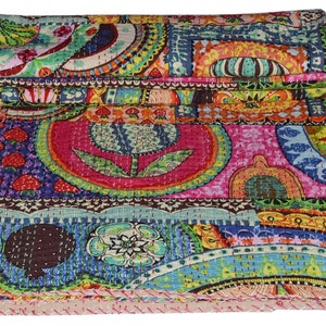 May include: A colorful kantha quilt with a patchwork design featuring various floral and geometric patterns in shades of pink, blue, green, yellow, and orange.