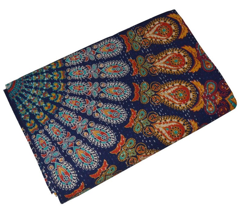 May include: A blue kantha quilt with a colorful paisley pattern. The quilt is made of cotton and is hand-stitched.