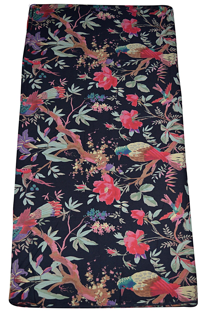 May include: Black fabric with a floral pattern featuring pink flowers, green leaves, and brown birds. The fabric has a vintage aesthetic.