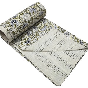 May include: White cotton kantha quilt with a floral pattern in shades of green and blue. The quilt is hand-stitched and has a traditional kantha design.