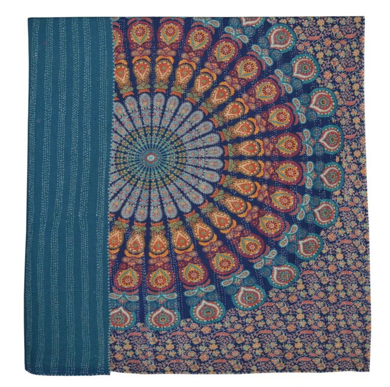 May include: A teal blue throw blanket with a large, colorful mandala design in the center. The mandala features a variety of colors, including orange, red, yellow, green, and blue. The blanket is made of a soft, comfortable fabric and is perfect for adding a touch of bohemian style to any room.