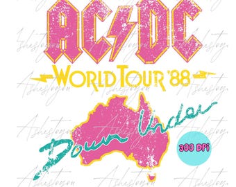 May include: A pink and yellow graphic design with the text "AC/DC World Tour '88" and a pink outline of Australia with the text "Down Under" in teal. The graphic has a distressed, vintage look.