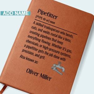 May include: A tan leather-textured notebook featuring the printed definition of a pipefitter, a small graphic of a pipe and wrench, and the name Oliver Miller. The text includes the phrase ADD NAME in a blue box at the top left corner.