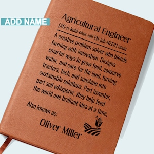 May include: A brown leather notebook with the text "Agricultural Engineer" and a definition. The definition describes the role of an agricultural engineer. The name "Oliver Miller" is printed at the bottom. A ribbon bookmark is visible.