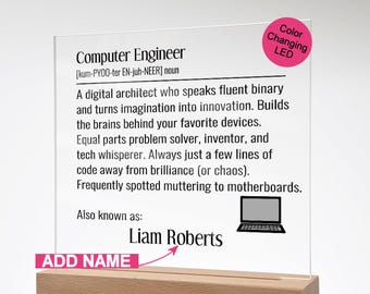 May include: Clear acrylic desk sign with the definition of "Computer Engineer" and a space to add a name. Includes a color-changing LED and a wooden base. The sign features a laptop graphic.