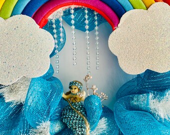 Rainbow wall hanging with blue mermaid