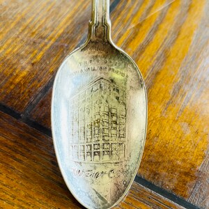 Vintage "Store with a Million Friends" Walt Co. Novelty Teaspoon circa 1930's 1881 Rogers A1 Silver Plate in Good Condition