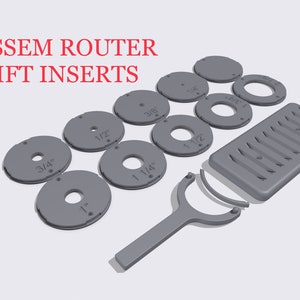 May include: A set of grey plastic router lift inserts for a Jessem router table. The inserts are in various sizes, including 3/4", 1/2", 3/8", 1", 1 1/4", and 1 1/2". A grey plastic tool is included for removing the inserts.
