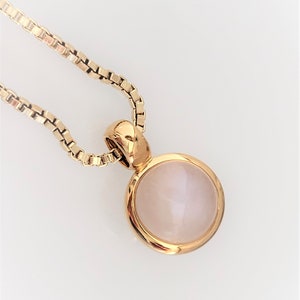 Pendentif pierre de lune dorée