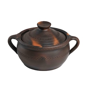 May include: A brown ceramic pot with a lid and two handles. The pot has a decorative design around the rim.