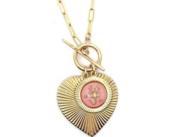 Beautiful Ribbed Heart and Vintage Pink Zodiac toggle necklace on 14 karat gold filled paperclip chain, unique astrological jewelry