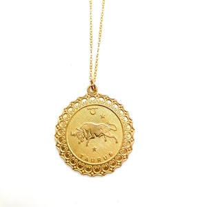 Large vintage zodiac sign disc necklace, cool boho Taurus horoscope sign charm, gold taurus bull astrological medallion necklace, brass disc