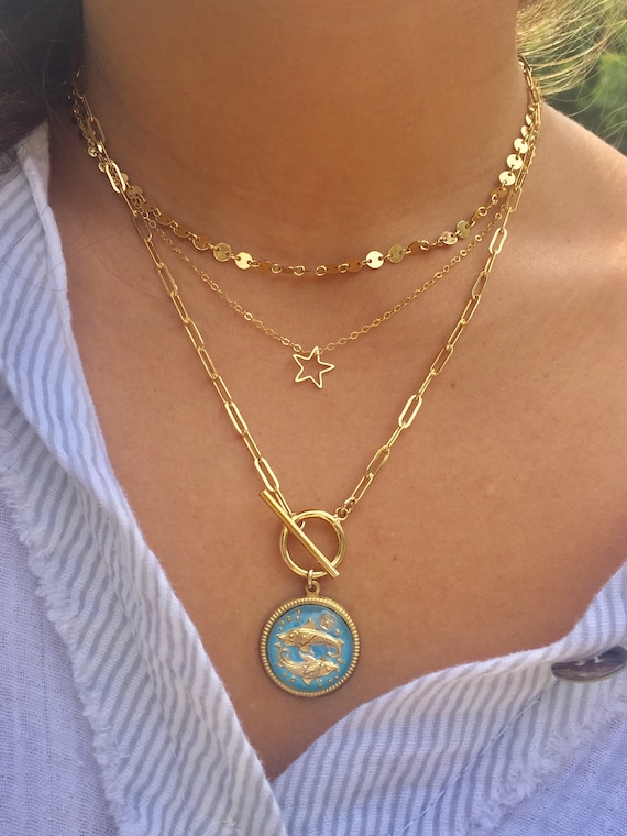 Coller pendentf posson ange artculé fnton doré oel écarqullé
