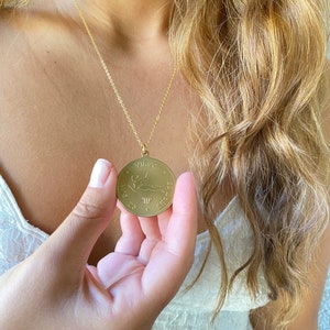 May include: Gold necklace with a round pendant featuring the Virgo zodiac sign and dates August 23 - September 22.