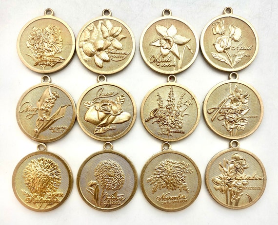 Lot of 12 vintage flower of the month charms, set… - image 1