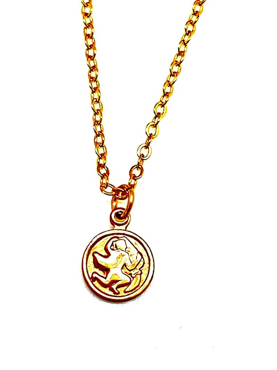 Tiny gold zodiac sign  Vintage Aquarius necklace  