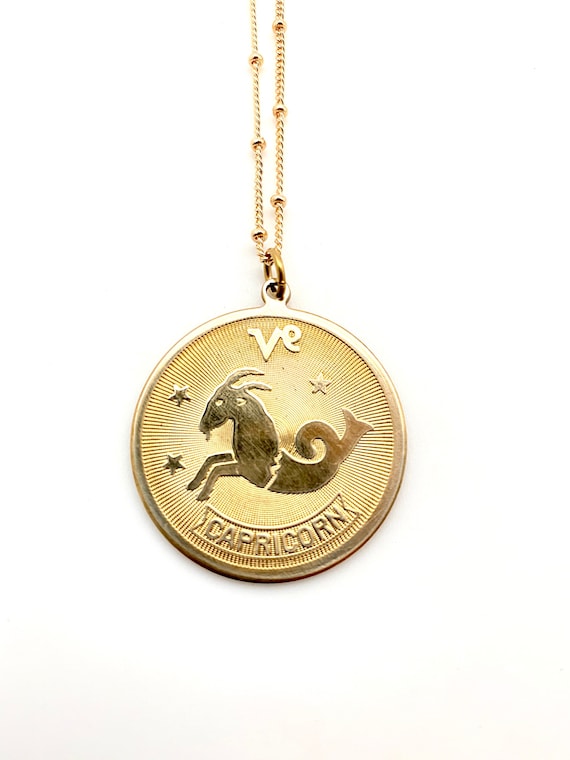 Vintage brass capricorn disc coin medallion charm… - image 2