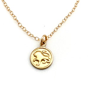 Tiny gold zodiac sign  Vintage leo necklace  Little zodiac leo lion disc  1970's zodiac charms  Stacking leo horoscope gold necklace