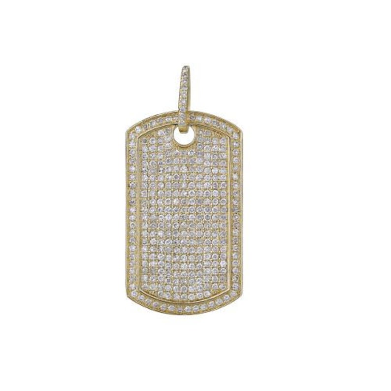 May include: A gold dog tag pendant with a pave setting of small diamonds.