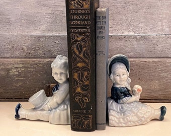 Vintage Boy and Girl Seated Bookends | Hand Painted Blue and White Porcelain Children Bookend Set | Blue and White Decor