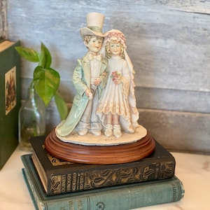 A Belcari Figurine - Etsy