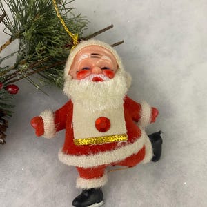 Vintage Flocked Santa Claus Ice Skating Christmas Ornament