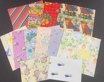 May include: Assortment of vintage wrapping paper featuring various patterns and designs, including a red and white striped pattern, a floral pattern, a pattern with a birthday cake, and a pattern with Santa Claus.